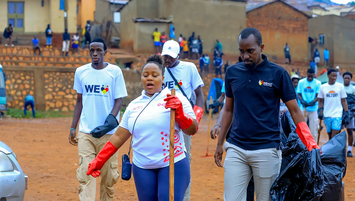 WEHAT Foundation Uganda NGO and MOVIT volunteers during community cleaning outreach in Acholi  quarters in kampala Uganda 2024